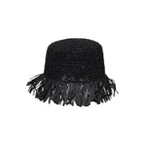 Black raffia bucket hat with fringe, featuring toquilla straw and frayed edges, Isola - Packable