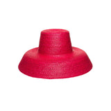 Red straw sun hat made from natural mocora straw, perfect for sunny days in Bali