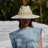 Stylish toquilla straw Ine hat with chain detail, ethically handcrafted for a chic look
