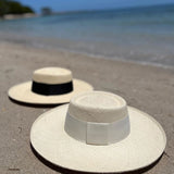 Two Ibiza Wide Brim Toquilla Straw hats showcasing genuine Panama hat style