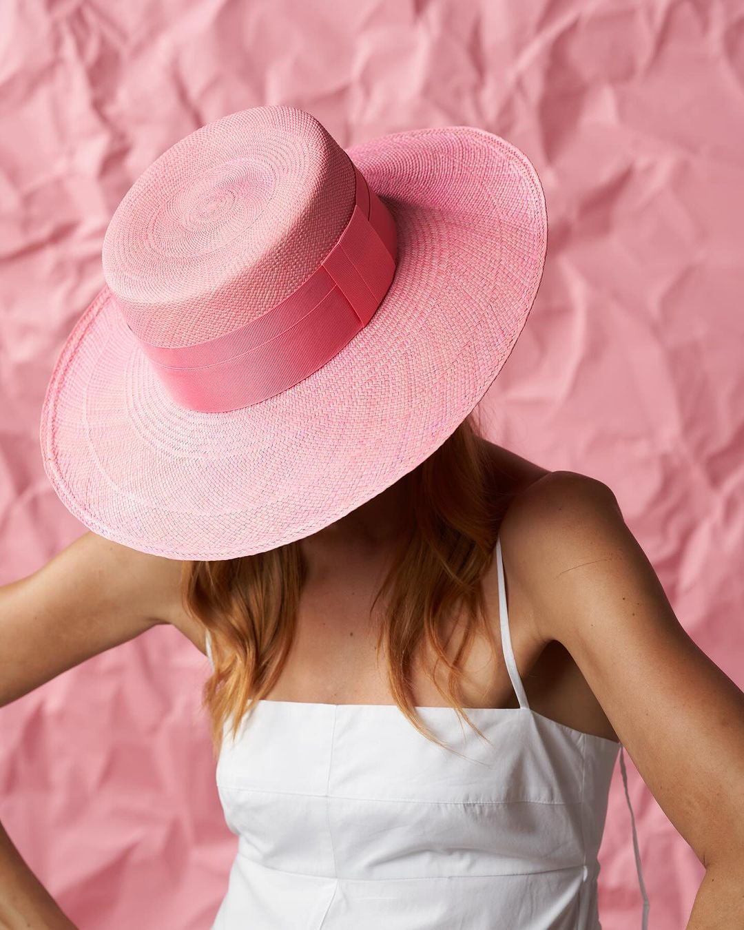 Pink Yaku Wide Brim hat made from genuine Toquilla straw for stylish sun protection