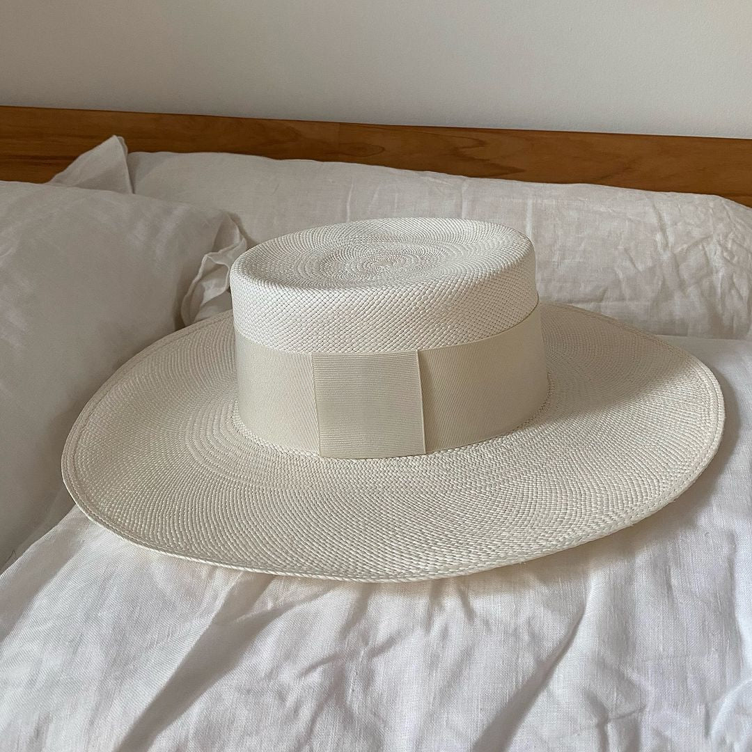 White straw boater hat Pinta made from sustainable toquilla straw materials