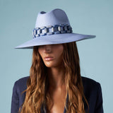 Handcrafted blue toquilla straw fedora with a beaded band, named Ine