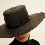 Black wide brim Jacaranda toquilla straw hat with twisted band for stylish sun protection
