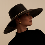 Extra wide brim black straw hat made of toquilla straw, perfect for sun protection