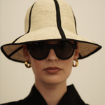 Stylish Sandra Foldable Hat made of natural toquilla straw with black trim