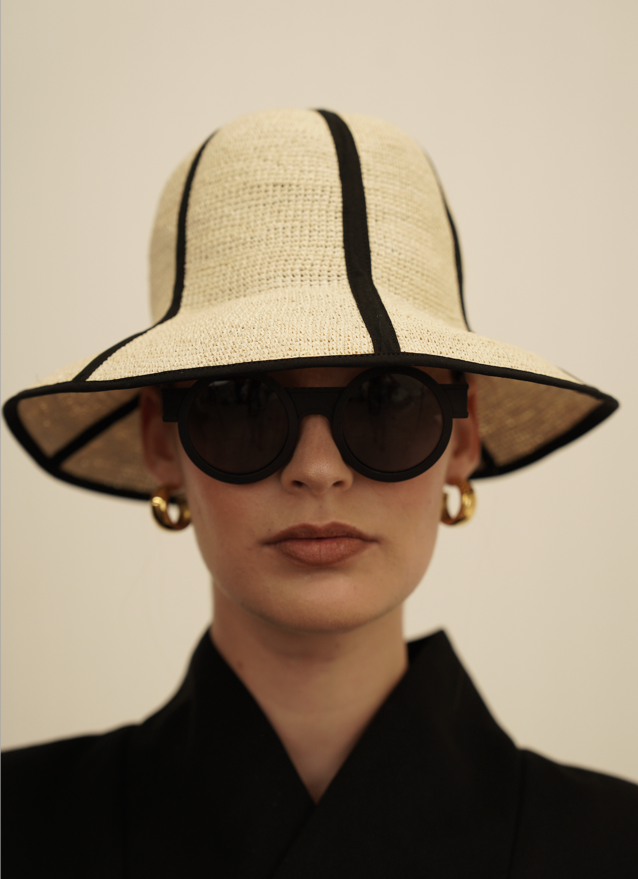 Stylish Sandra Foldable Hat made of natural toquilla straw with black trim