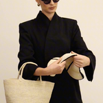 Woven straw tote bag made of natural toquilla straw, featuring the Sandra - Foldable design