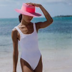 White textured one-piece swimsuit paired with Yaku Wide Brim genuine Panama hat