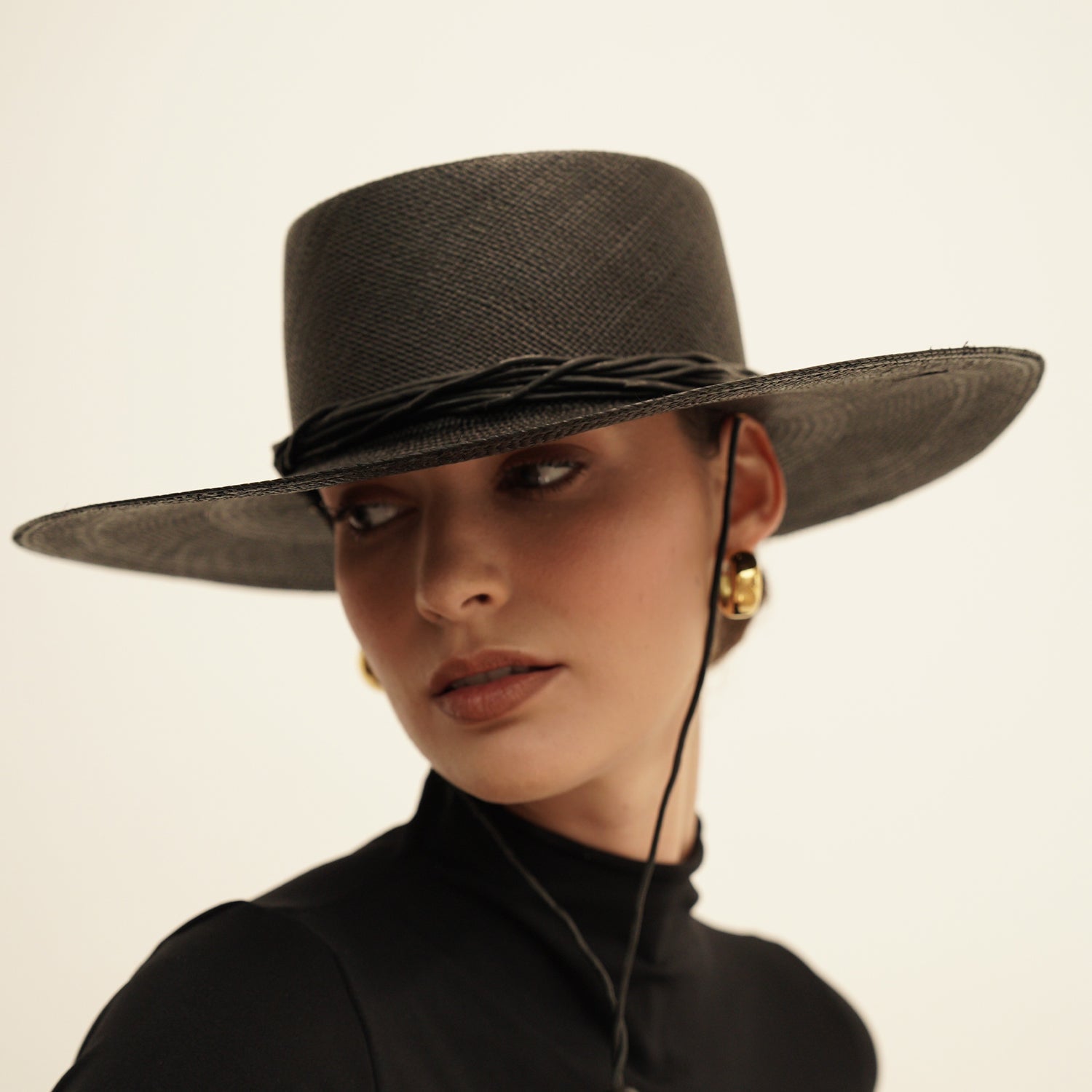 Black wide brim Jacaranda hat made of toquilla straw with a braided band