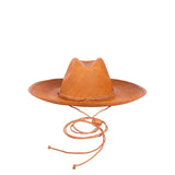 Brown straw cowboy hat made of natural toquilla straw, featuring a chin strap for style
