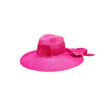 Bright pink hand dyed toquilla straw sun hat with custom initials for a stylish summer