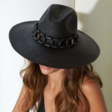 Black woven hat with beaded band made from sustainable materials, named Ine