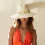 Wide-brimmed toquilla straw hat with beaded band, a genuine Panama hat made from sustainable materials