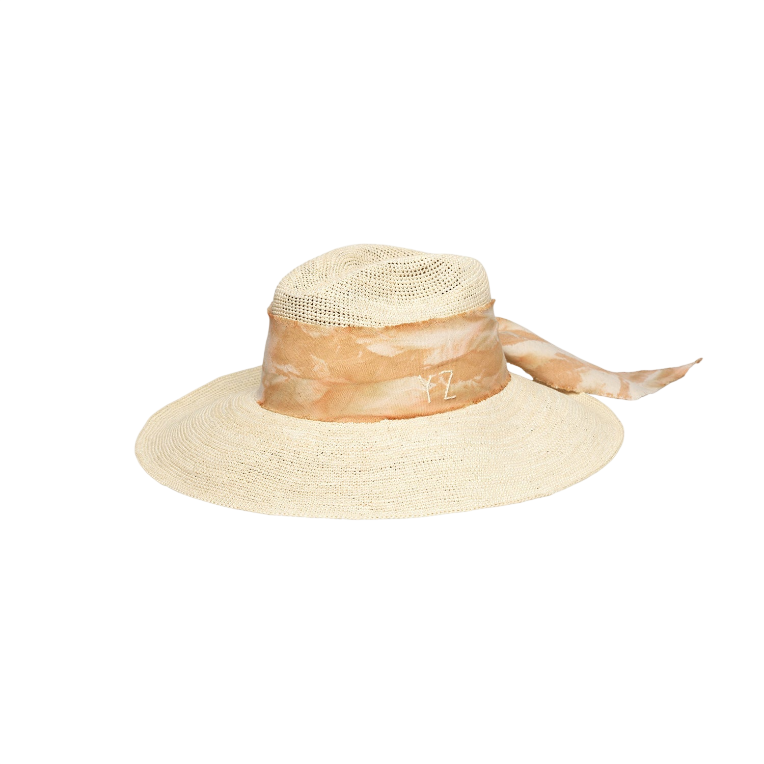 Wide-brimmed straw hat with patterned ribbon and custom initials in hand dyed toquilla straw