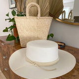 Wide-brimmed white straw Torino hat made of toquilla straw with rope accent
