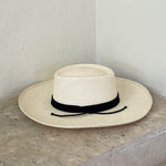 Wide brim Puglia genuine Panama hat made of toquilla straw with a black band