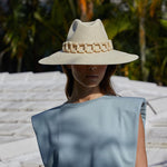 Stylish toquilla straw Ine hat with chain detail, ethically handcrafted for a chic look
