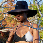 Black wide-brimmed Antibes hat made from toquilla straw and sustainable materials