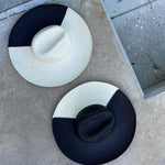 Two-toned straw hats made of toquilla straw, a genuine Panama hat, ethically handcrafted