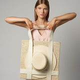 Woven tote bag with hat made from natural toquilla straw in Nativa collection