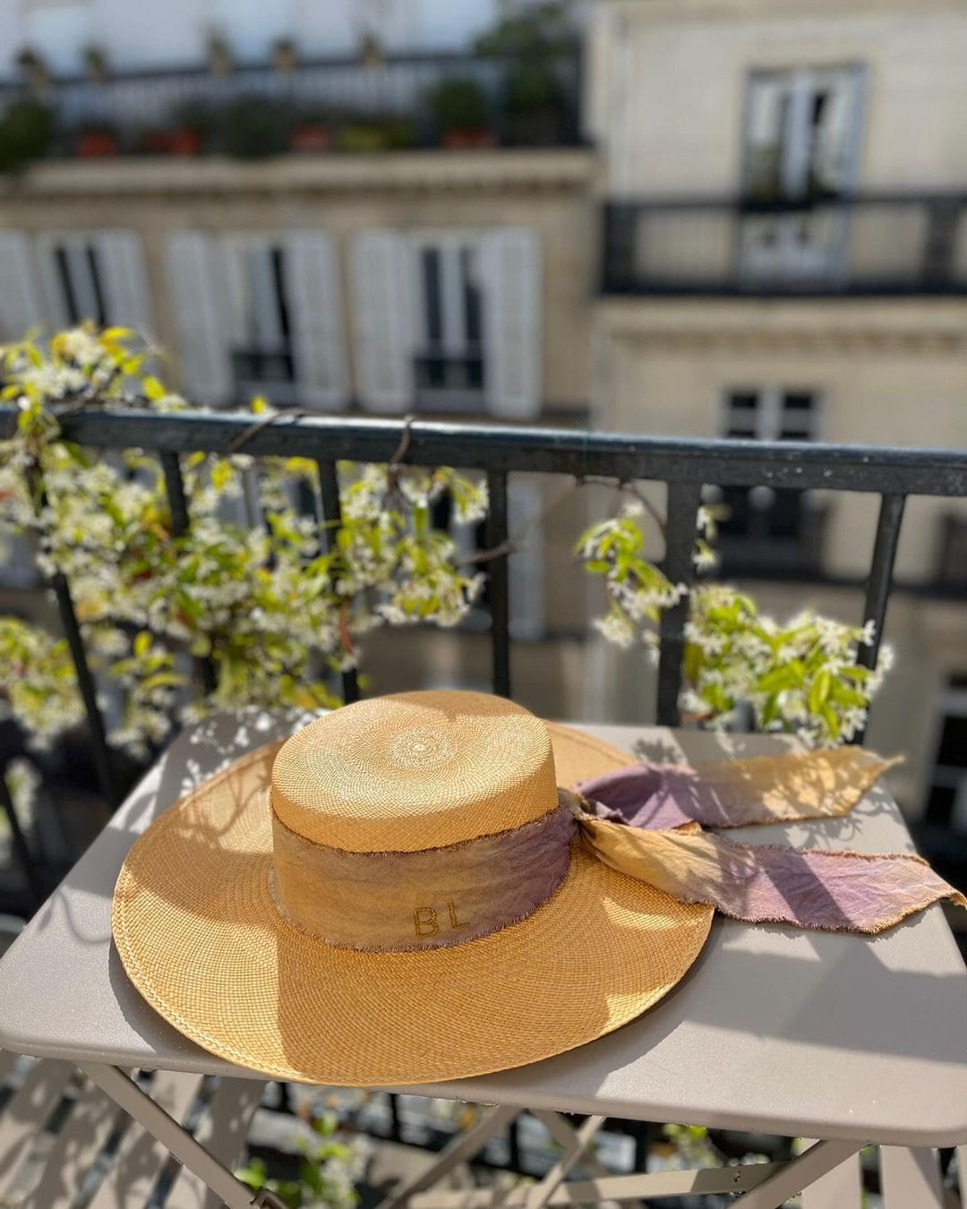 Straw sun hat with ribbon featuring custom initials in hand dyed Toquilla straw