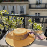 Straw sun hat with ribbon featuring custom initials in hand dyed Toquilla straw