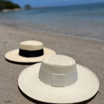 Two Ibiza Wide Brim Toquilla Straw hats showcasing genuine Panama hat style