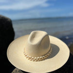Peoni Wide Brim hat made from natural toquilla straw with a stylish beaded band