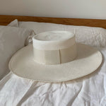 White straw boater hat Pinta made from sustainable toquilla straw materials