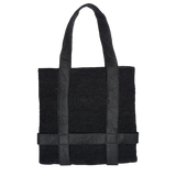 Black woven tote bag with leather straps made of natural toquilla straw Nativa