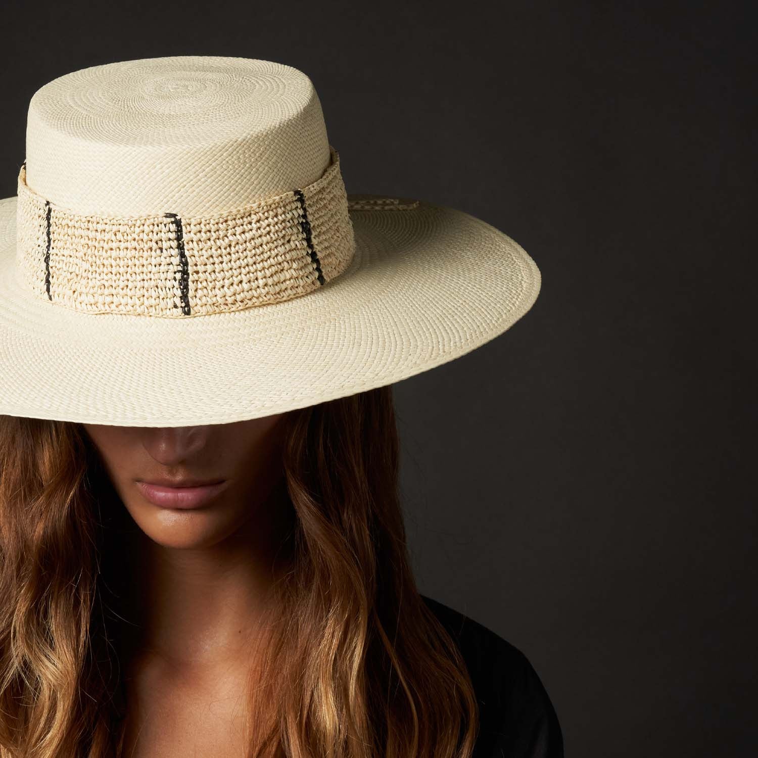 Wide-brimmed straw hat named Toledo made of natural toquilla straw with a decorative band