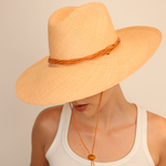 Wide-brimmed straw hat named Bromelia with chin strap made from natural toquilla straw