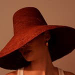 Wide-brimmed woven hat from Verona featuring an extra wide brim and packable design