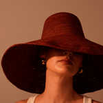 Wide-brimmed woven hat from Verona featuring an extra wide brim and packable design