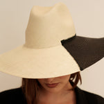 Two-tone straw sun hat made of toquilla straw, featuring sustainable materials in Cassis