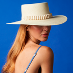 Stylish Raku Wide Brim straw hat adorned with tagua nut beads for a chic summer look