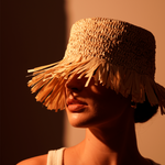 Fringed toquilla straw sun hat with frayed edges, genuine Panama hat from Isola