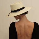 Cream-colored toquilla straw wide brim hat with black ribbon - Puglia Collection