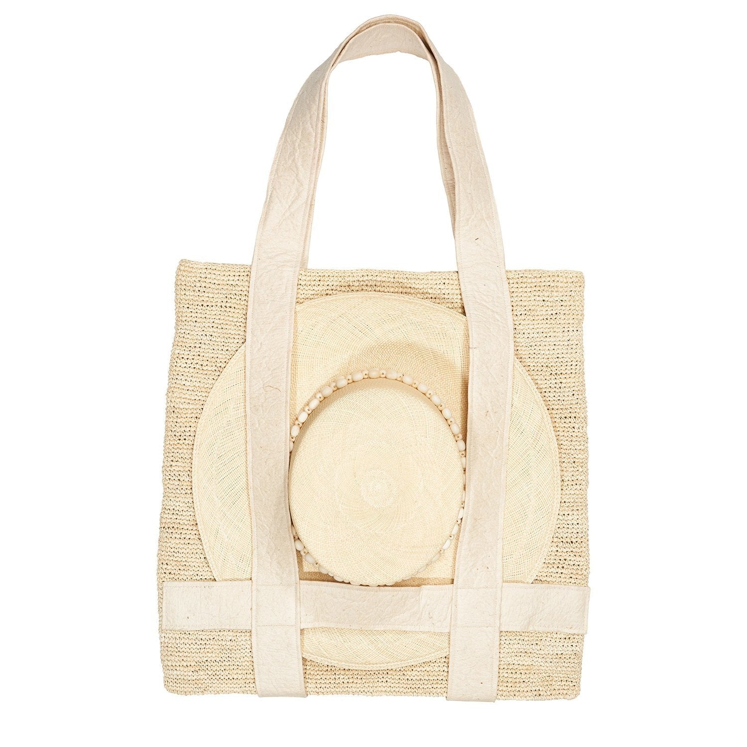 Woven tote bag with hat made from natural toquilla straw, perfect for stylish outings