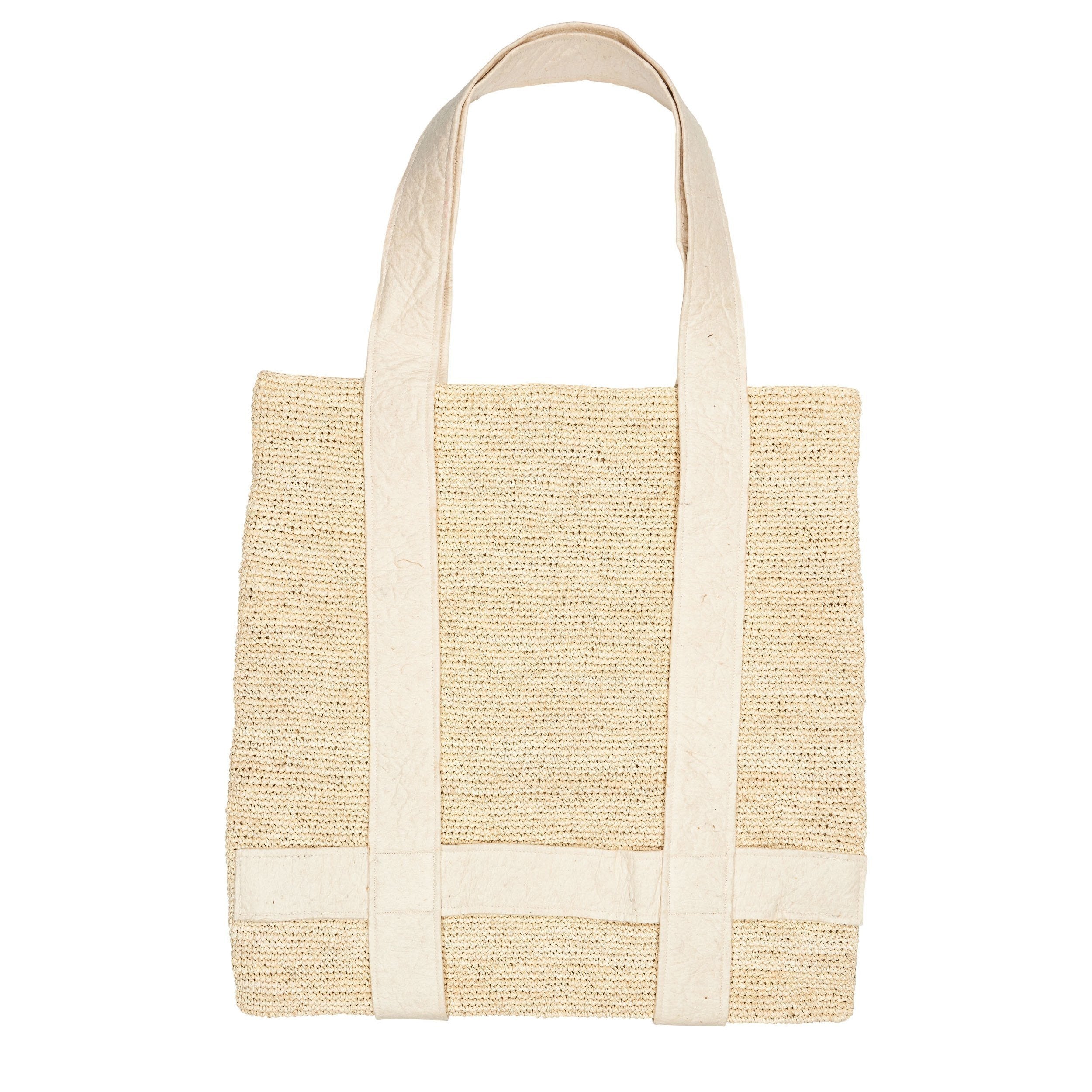 Woven Nativa tote bag with canvas straps made from natural toquilla straw