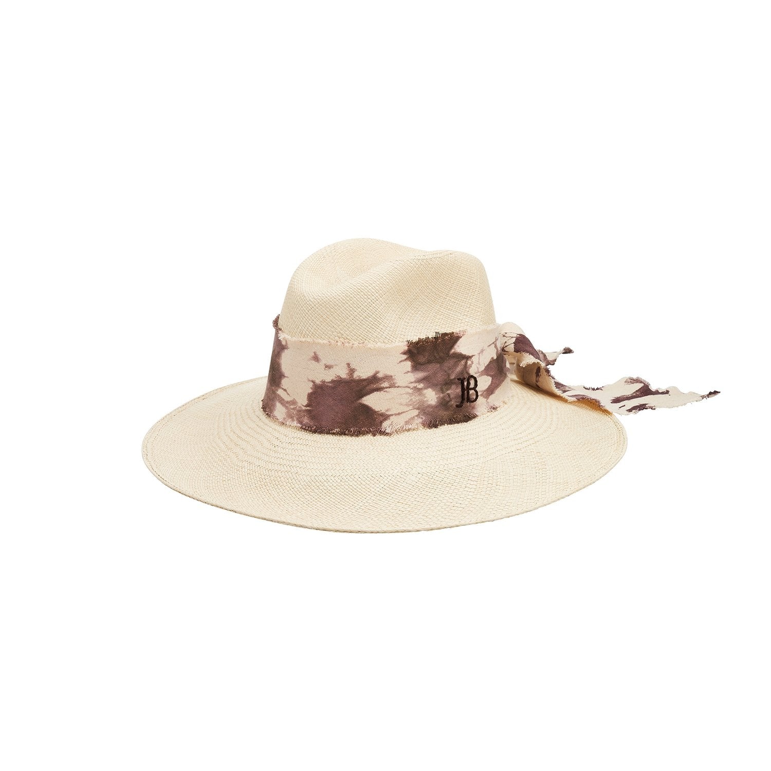 Cream-colored toquilla straw hat with hand dyed tie-dye ribbon and custom initials